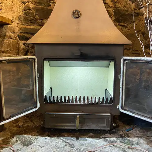 A wood burner after repair work