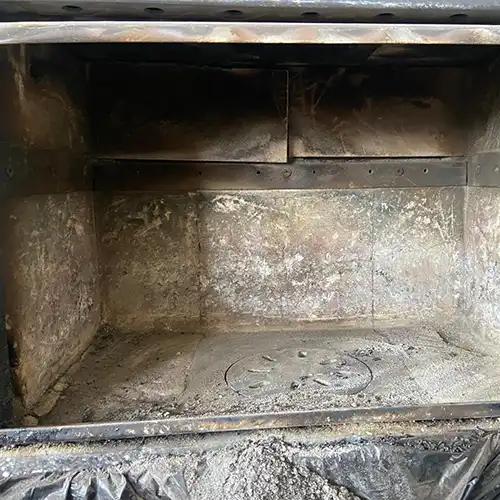 Wood burner with old broken fire bricks